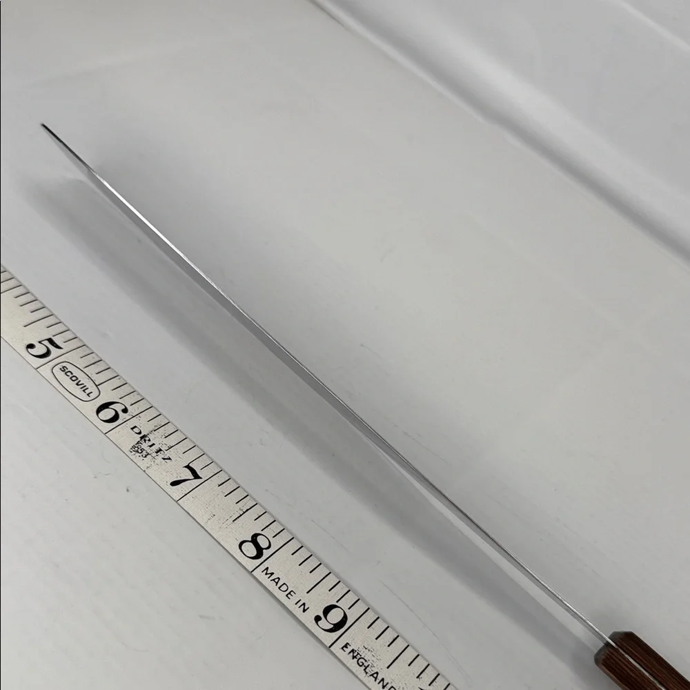Source Unknown sleek spatula